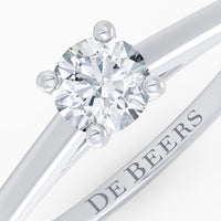 Bague classic avec diamant brillant et platine